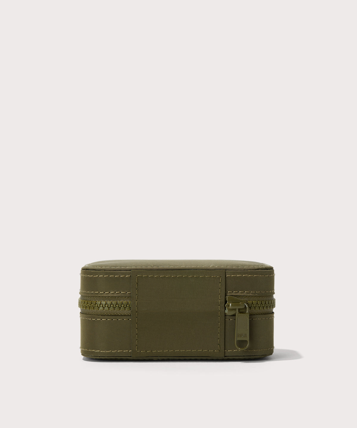 Dagne Dover small Frankie Jewelry Case in dark green seen from the back.
