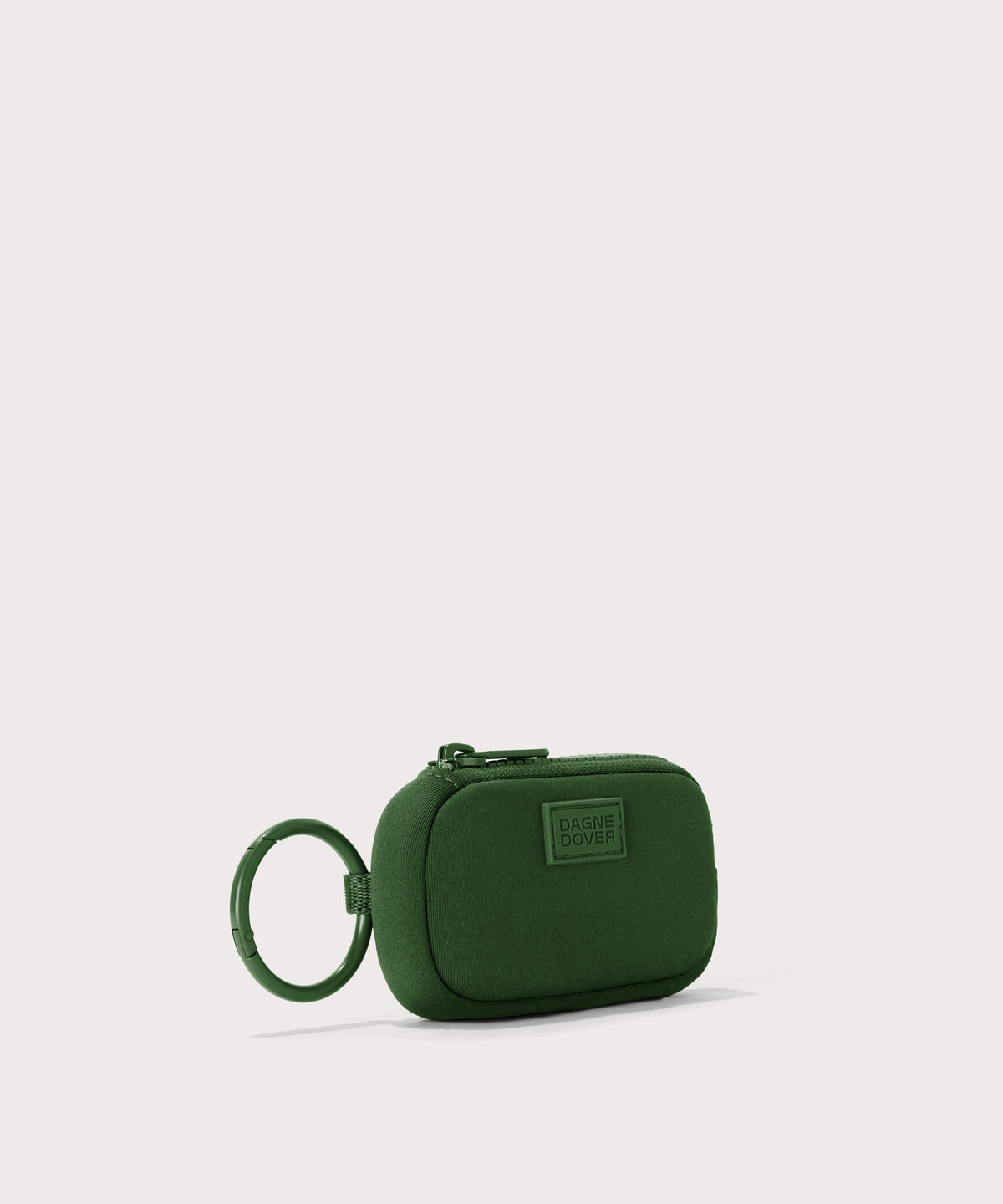 Dagne Dover Mara Keychain in a rich, classic forest green seen from an angle.
