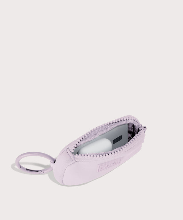 Dagne Dover Mara Keychain in a soft purple with grey undertones unzipped, showing interior.
