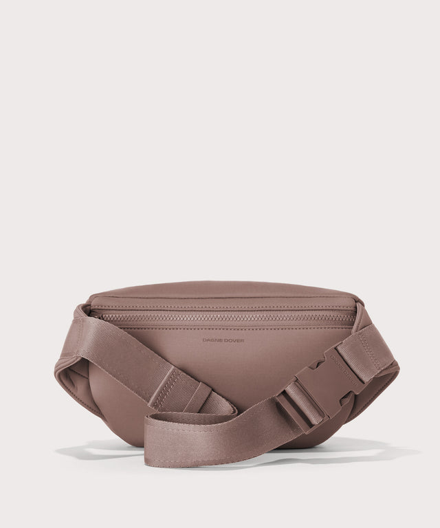 Dagne Dover jax large fanny pack in pink seen from the back.
