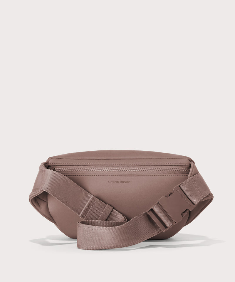 Dagne Dover jax large fanny pack in pink seen from the back.
