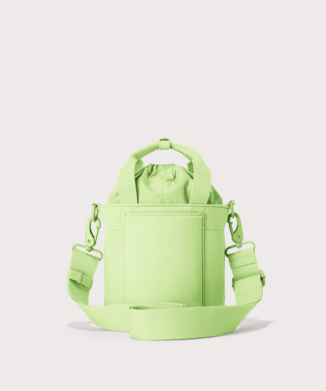 Dagne Dover Nico Bucket Bag in matcha, back angle.
