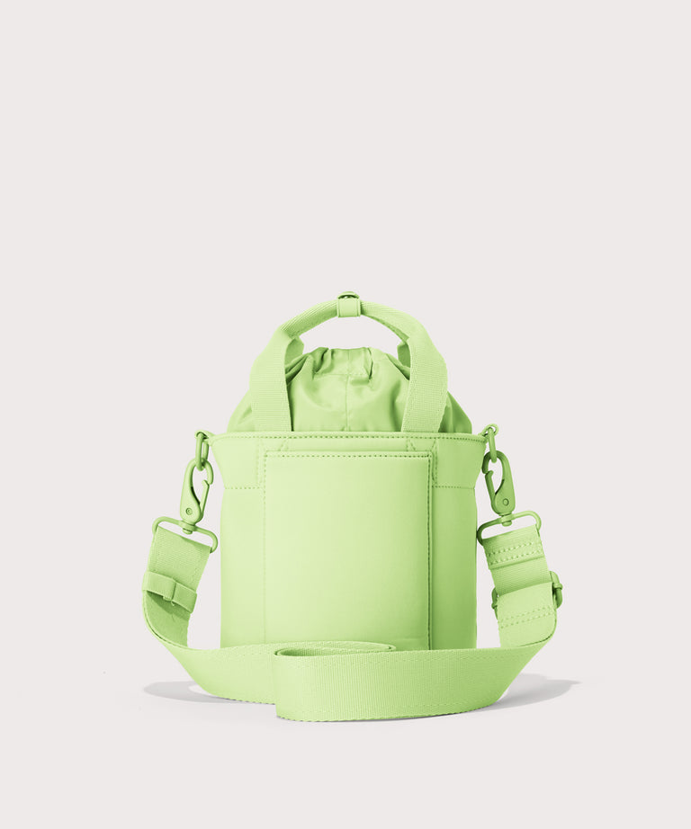 Dagne Dover Nico Bucket Bag in matcha, back angle.
