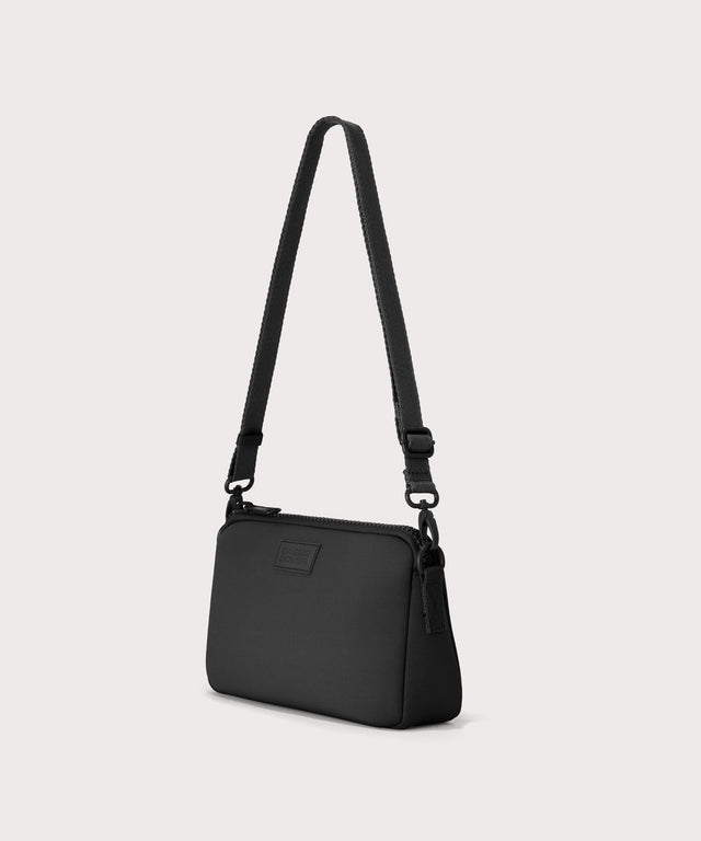 Dagne Dover Nora Shoulder Bag in black, back angle.
