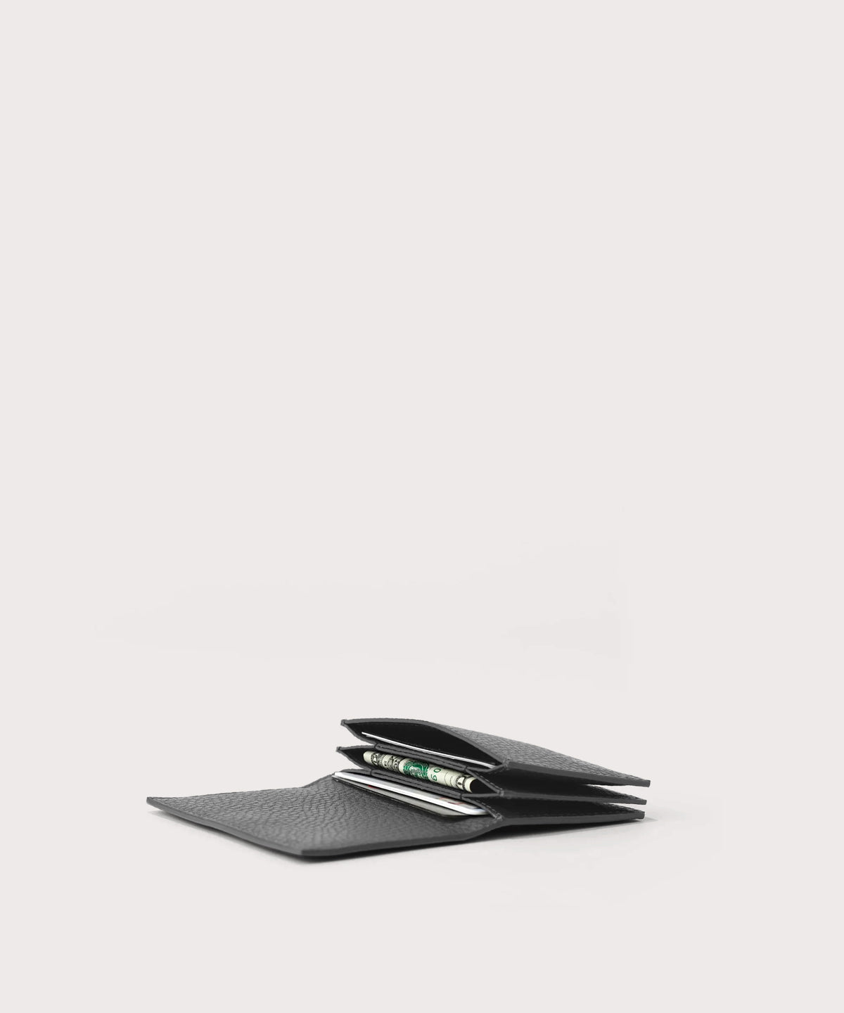 hover - Dagne Dover Accordion Card Case in grey opened, revealing the three internal gusseted card slots.