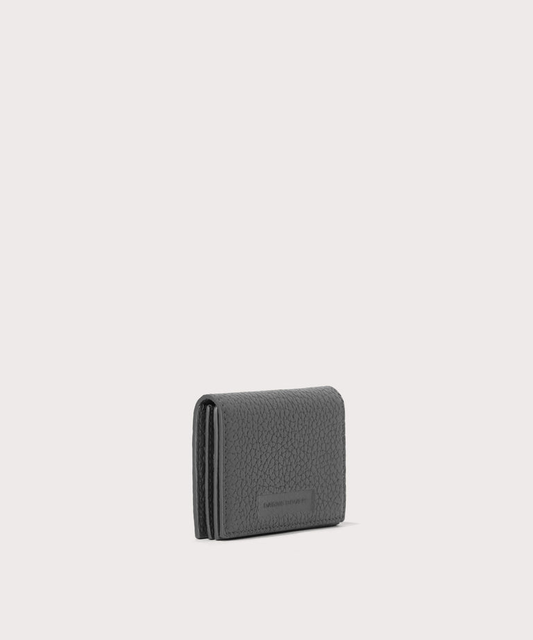 Dagne Dover Accordion Card Case in grey seen from an angle.