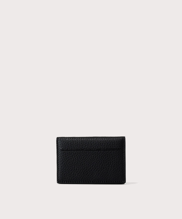 Dagne Dover Accordion Card Case in black revealing the external card slot.