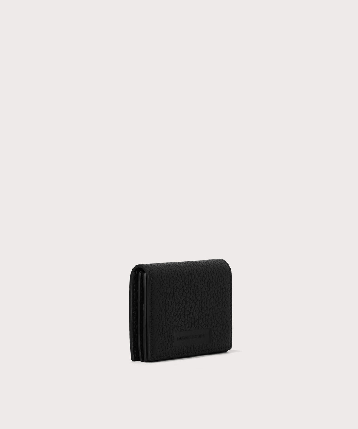 Dagne Dover Accordion Card Case in black seen from an angle.