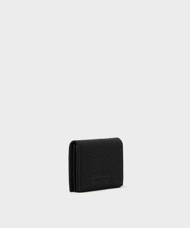 Dagne Dover Accordion Card Case in black seen from an angle.