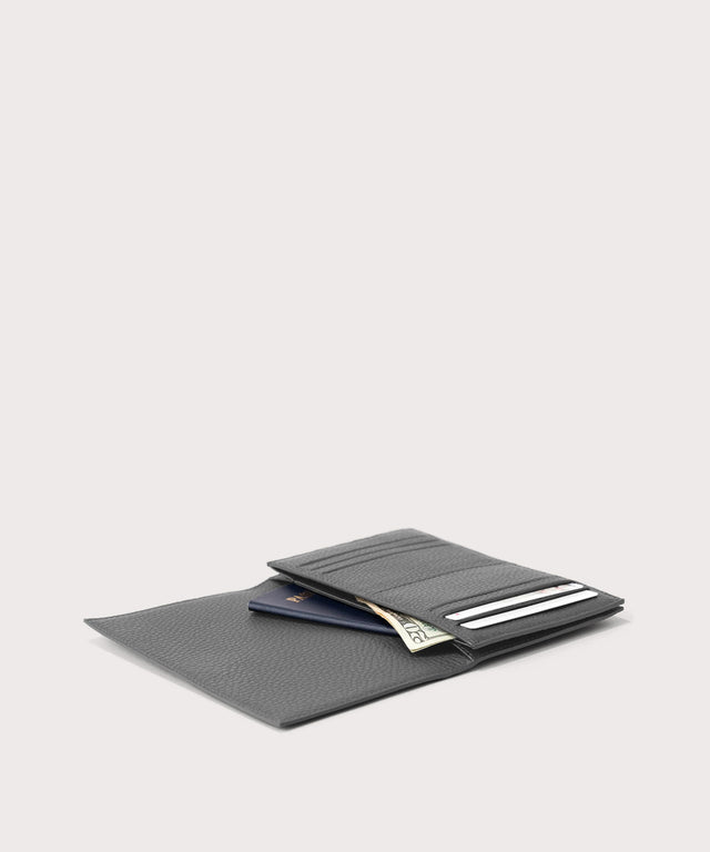 hover - Dagne Dover Accordion Travel Wallet in grey opened, revealing the internal card slots and internal gusseted card and passport slots.