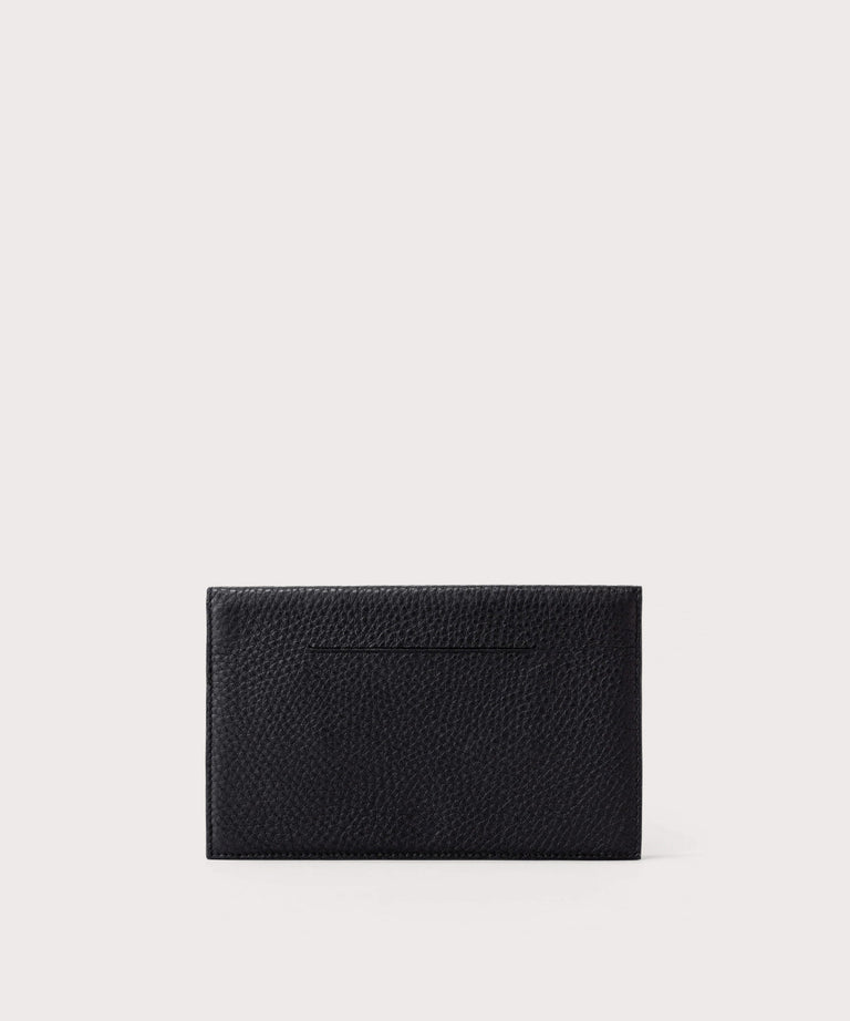Dagne Dover Accordion Travel Wallet in black, revealing the external card slot.
