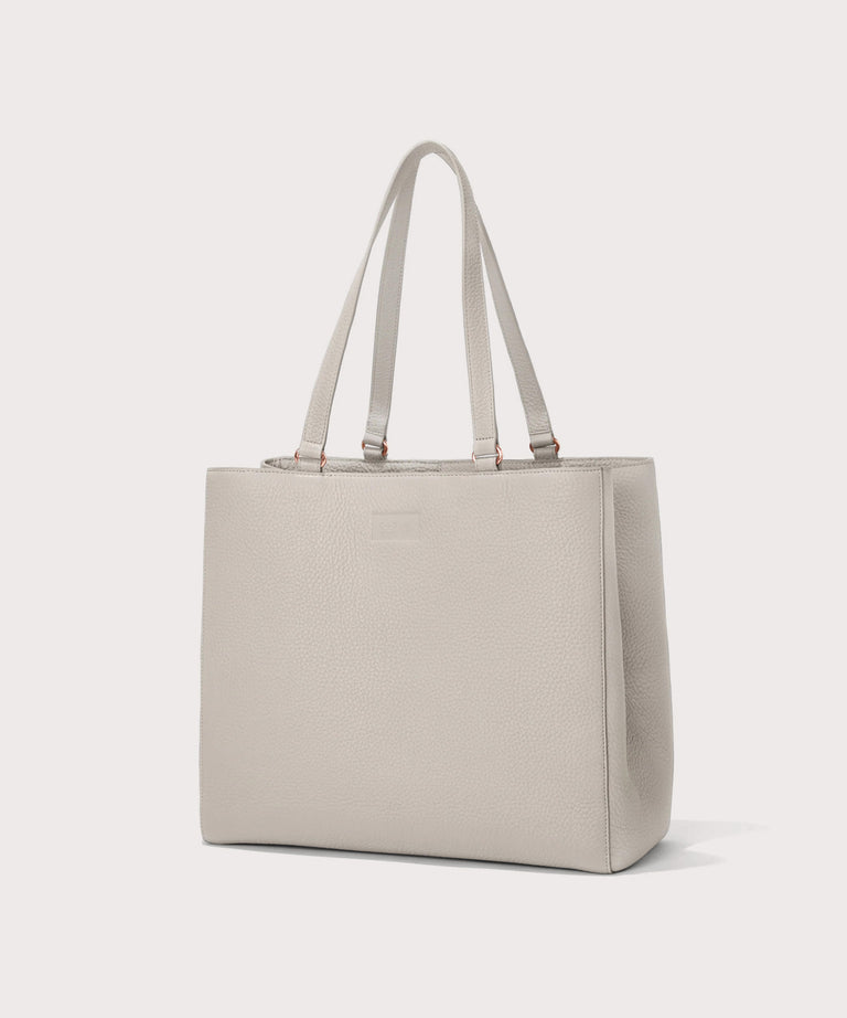 Dagne Dover large Allyn Tote in grey seen from an angle.
