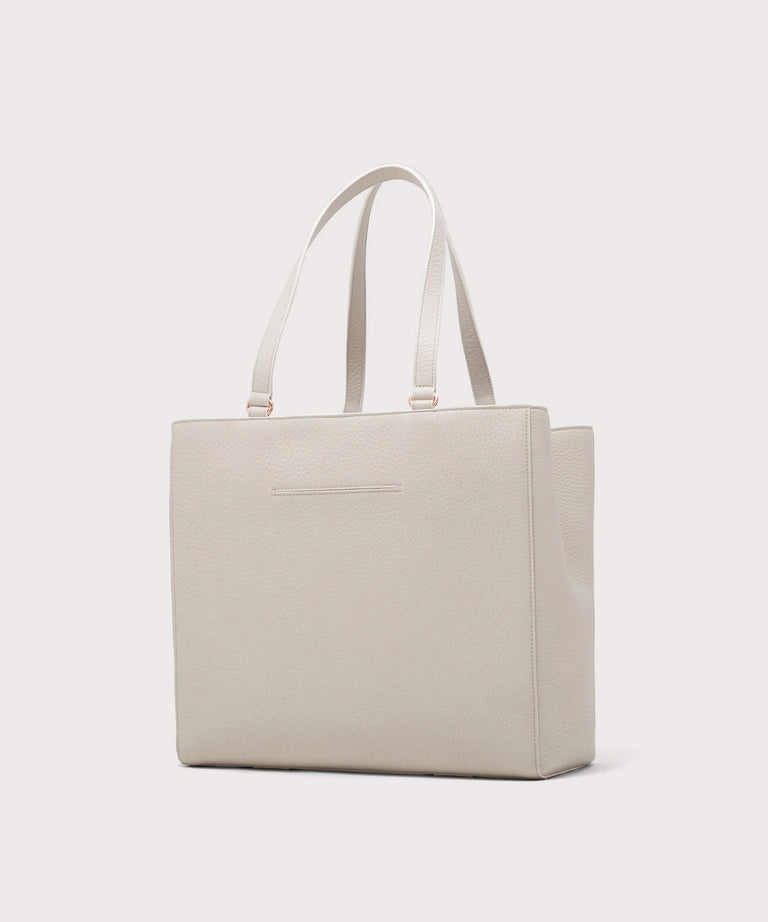 Dagne Dover large Allyn Tote in grey with the exterior slip pocket.
