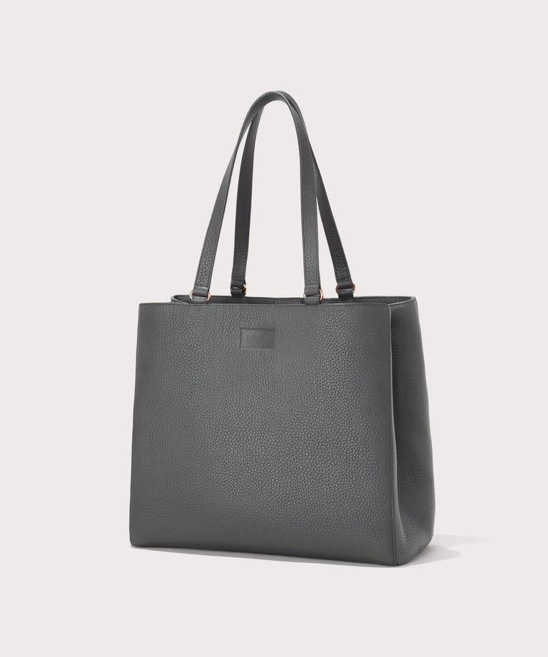 Dagne Dover large Allyn Tote in grey seen from an angle.

