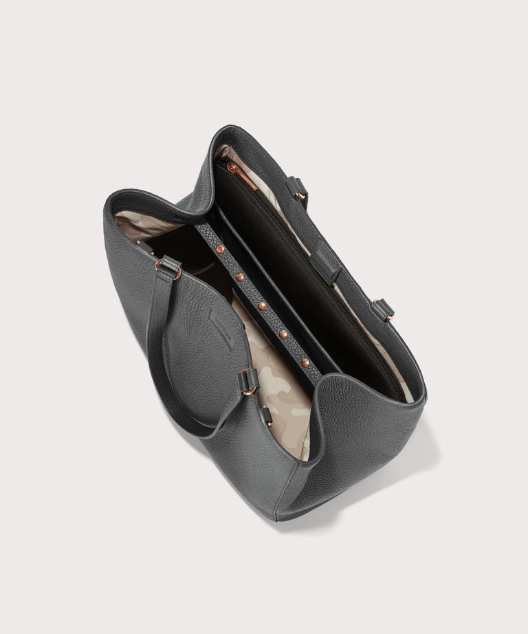 Dagne Dover large Allyn Tote in grey seen from above, revealing the interior slip pockets and laptop sleeve.
