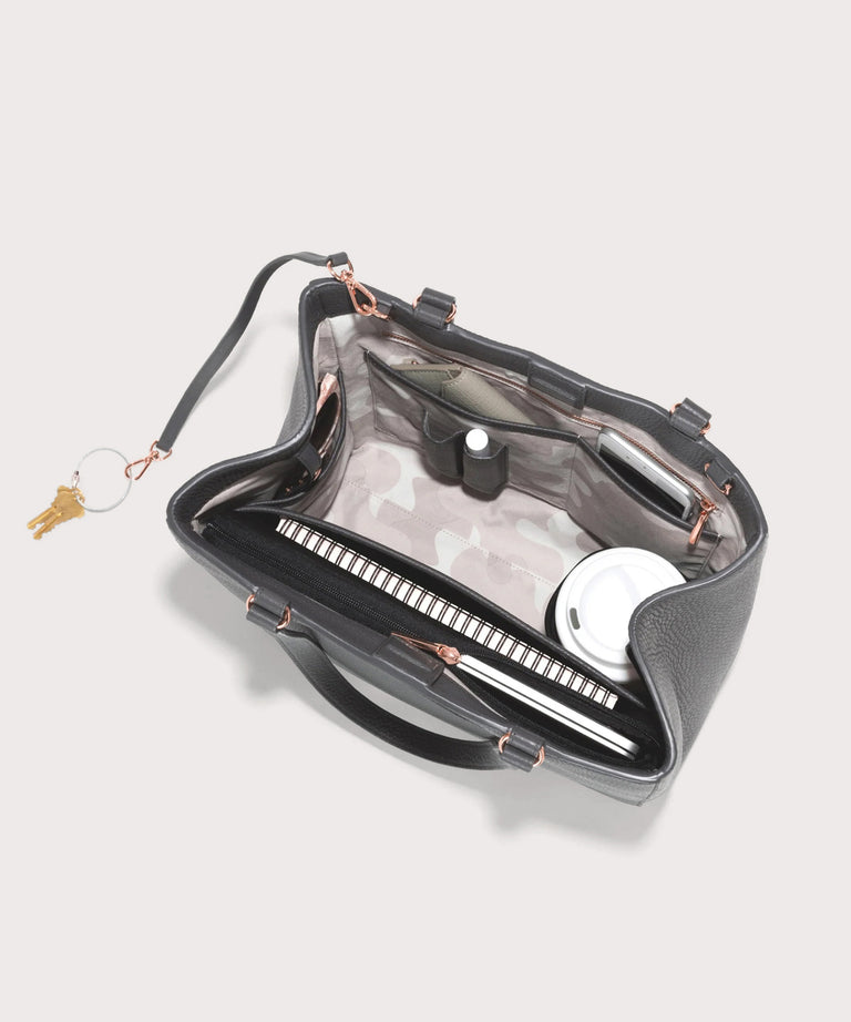 hover - Dagne Dover medium Allyn Tote in grey seen from above, revealing the interior slip pockets and laptop sleeve.
