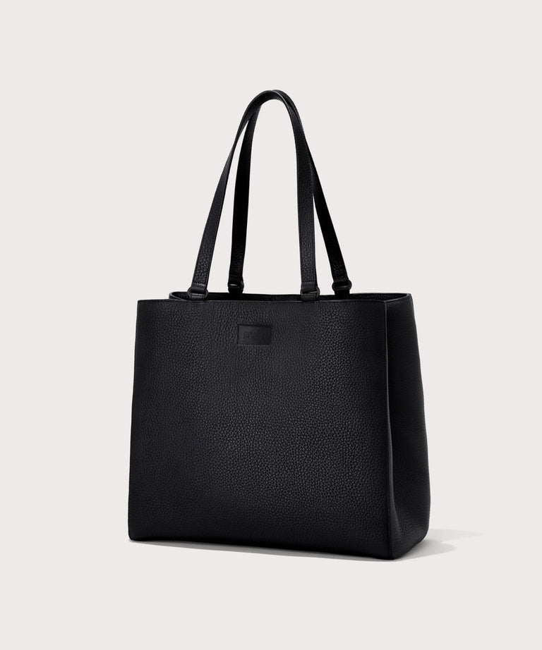 Dagne Dover large Allyn Tote in black seen from an angle.
