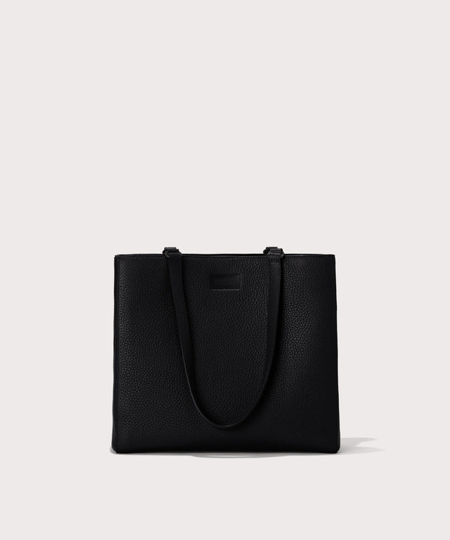 Dagne Dover medium Allyn Tote in black seen from the front.
