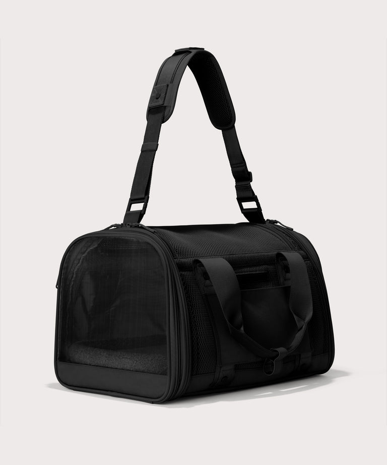 Dagne Dover Large Kyoto Pet Carrier in black seen from a back angle with crossbody strap.
