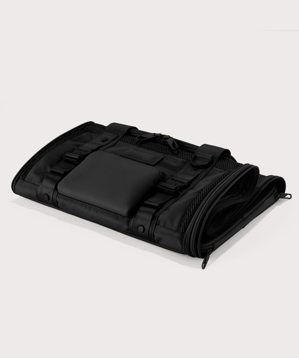 Dagne Dover Large Kyoto Pet Carrier in black folded flat.
