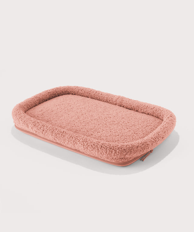 Dagne Dover Large Kyoto Pet Carrier removable padded faux sherpa pet bed in a warm dust pink.
