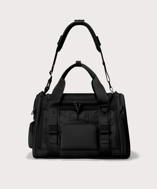 Dagne Dover small Kyoto Pet Carrier in black seen from the front with crossbody strap.
