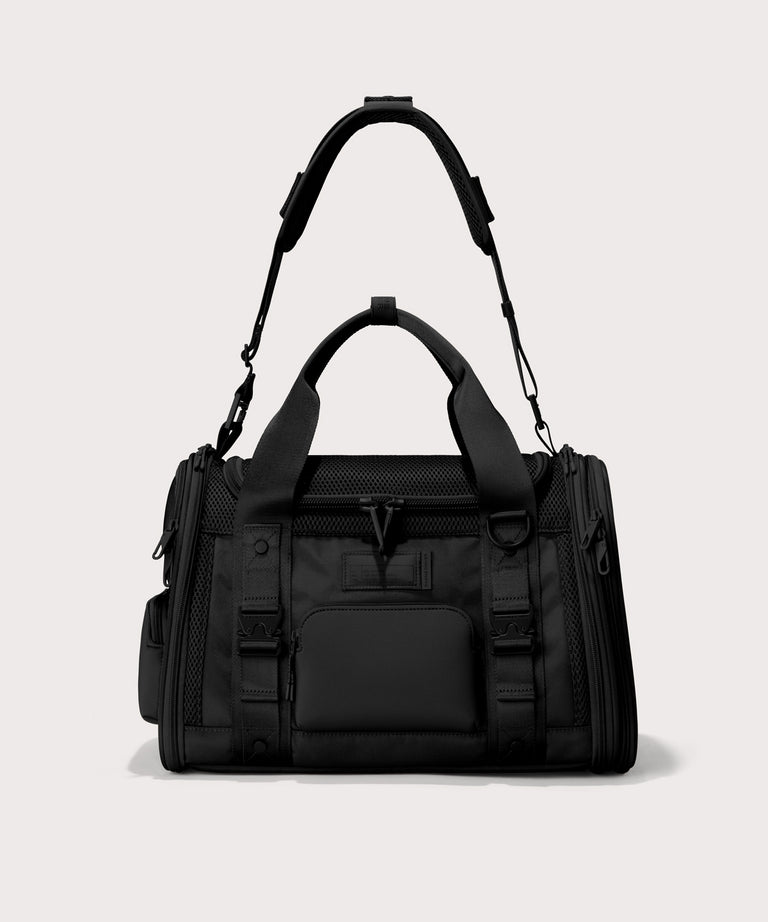 Dagne Dover small Kyoto Pet Carrier in black seen from the front with crossbody strap.
