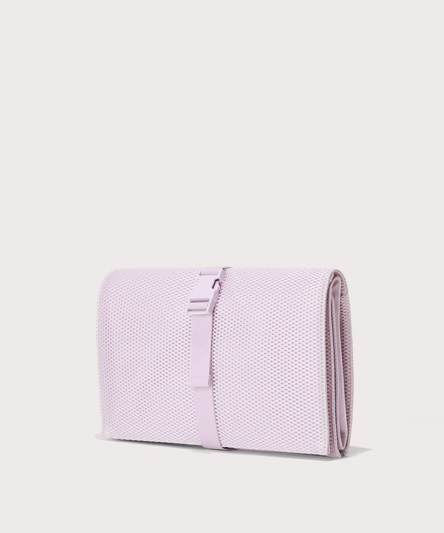 Dagne Dover Joey Changing Kit in  a soft purple with grey undertones seen from an angle.
