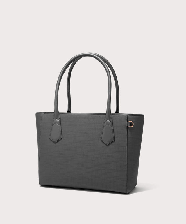 Dagne Dover classic Signature Leather Tote in grey seen from an angle.
