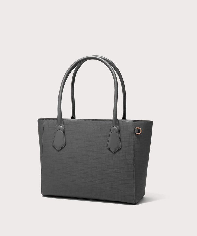 Dagne Dover classic Signature Leather Tote in grey seen from an angle.
