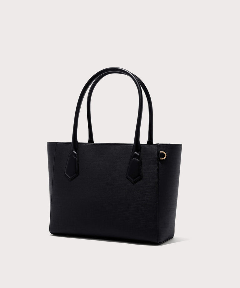Dagne Dover classic Signature Leather Tote in black seen from an angle.
