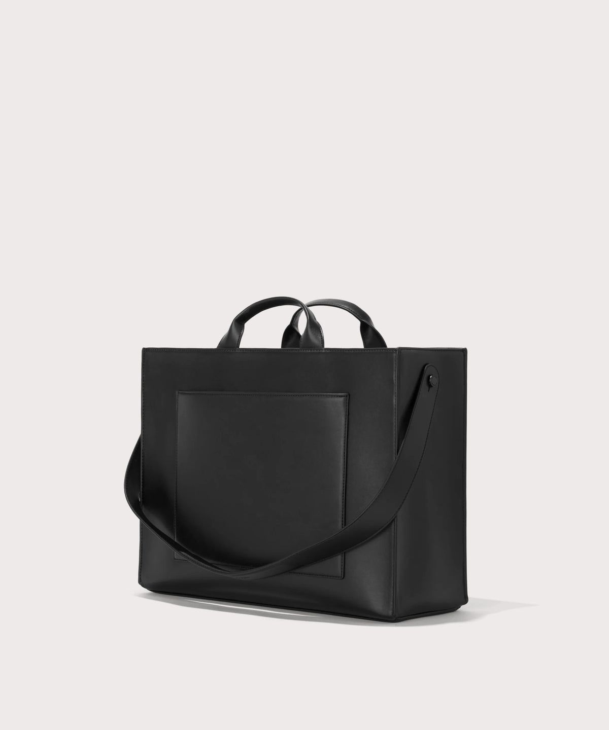 Dagne Dover large vegan Daily Tote in black seen from an angle.
