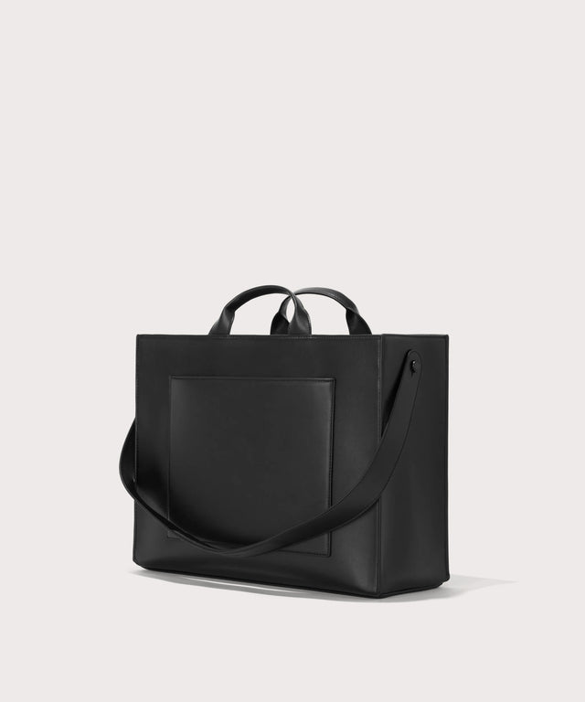 Dagne Dover large vegan Daily Tote in black seen from an angle.

