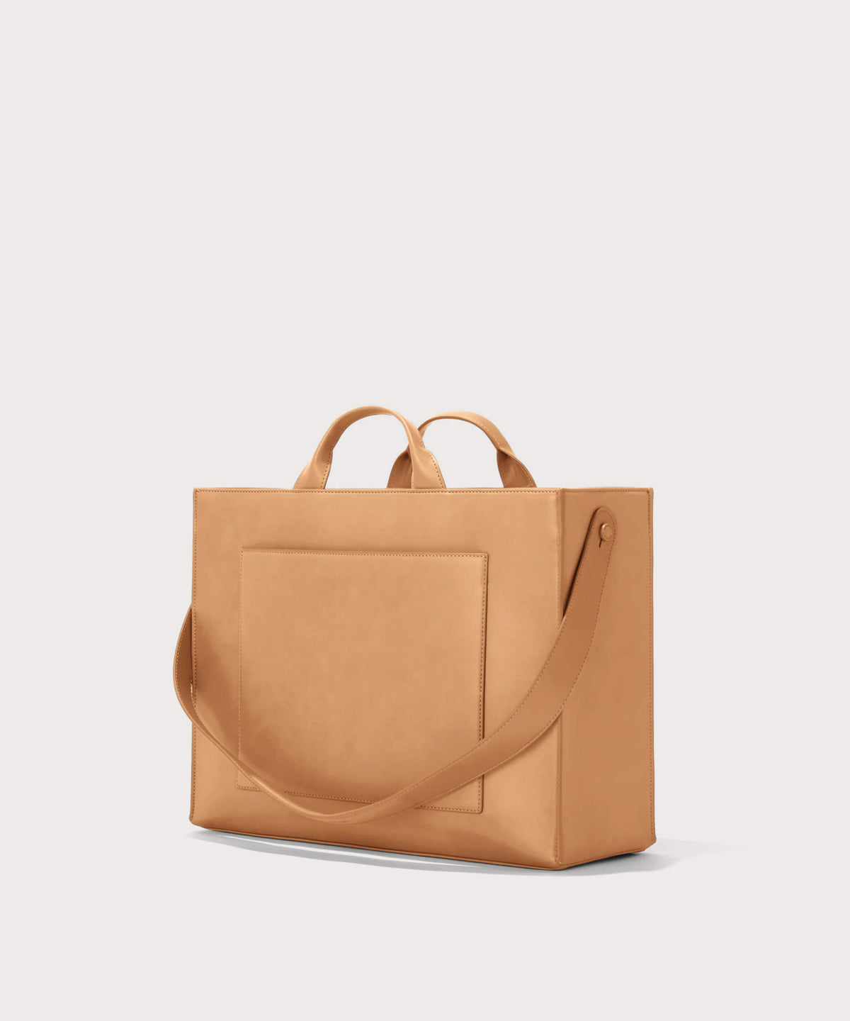 Dagne Dover large vegan Daily Tote in brown seen from an angle.
