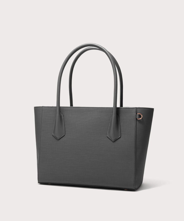 Dagne Dover Legend Signature Leather Tote in grey seen from an angle.
