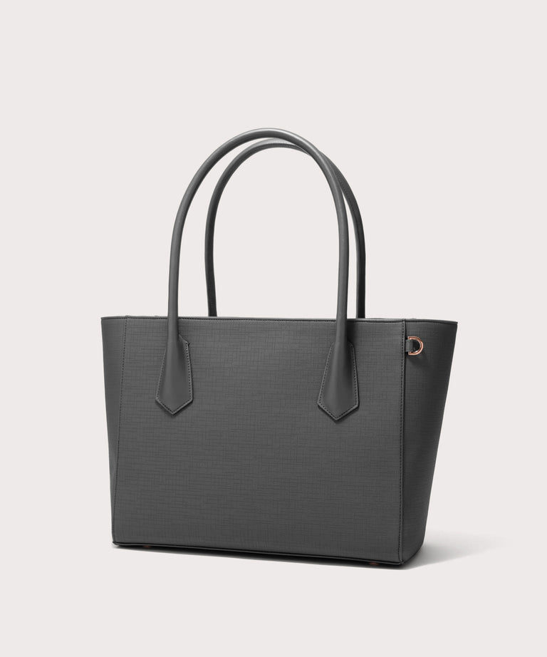 Dagne Dover Legend Signature Leather Tote in grey seen from an angle.
