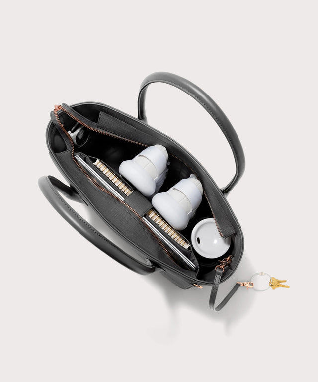 Dagne Dover Legend Signature Leather Tote in grey seen from above, revealing 2 slip pockets, the neoprene bottle holder, and large interior zipper pocket.