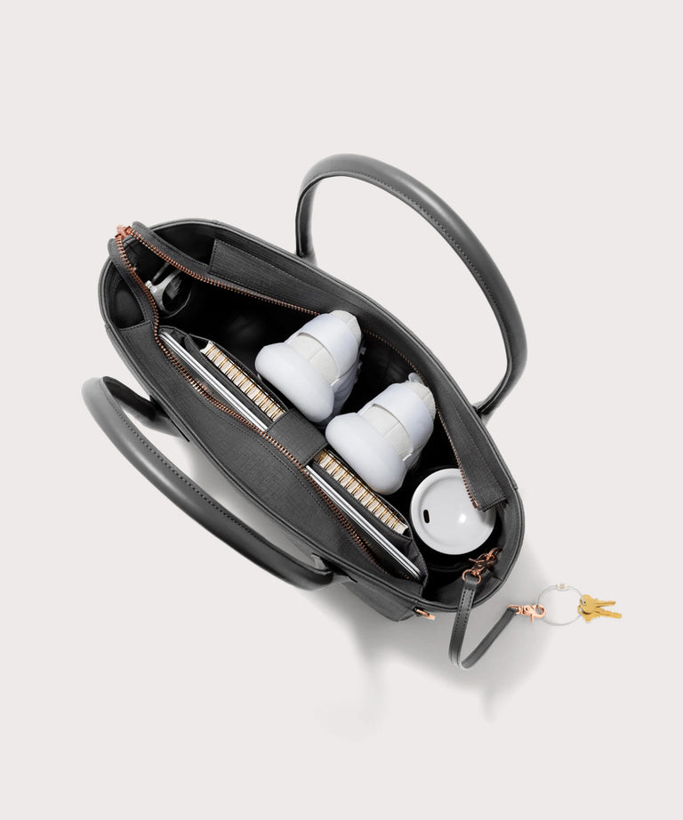 Dagne Dover Legend Signature Leather Tote in grey seen from above, revealing 2 slip pockets, the neoprene bottle holder, and large interior zipper pocket.