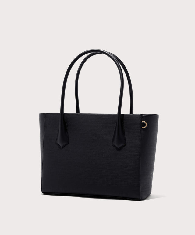 Dagne Dover Legend Signature Leather Tote in black seen from an angle.
