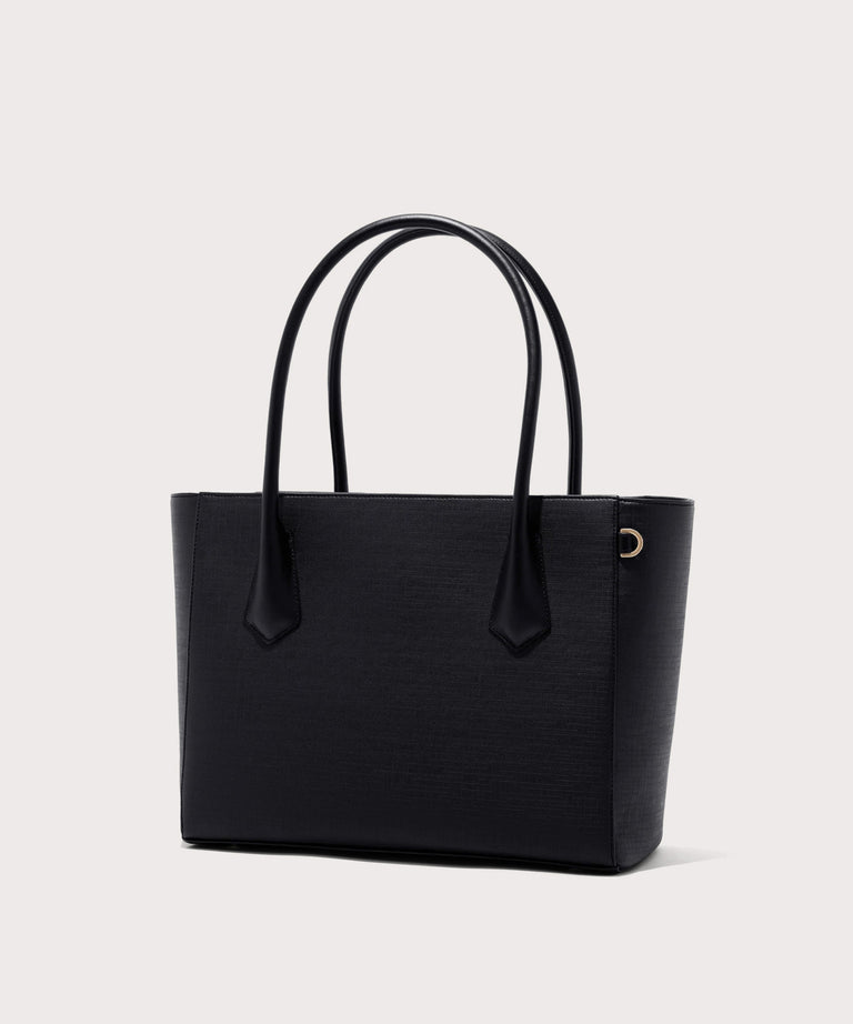 Dagne Dover Legend Signature Leather Tote in black seen from an angle.
