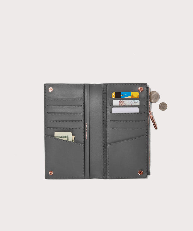 Dagne Dover Slim Wallet in grey unclasped, revealing ten card slots, two additional slip pockets, and four cash pockets.