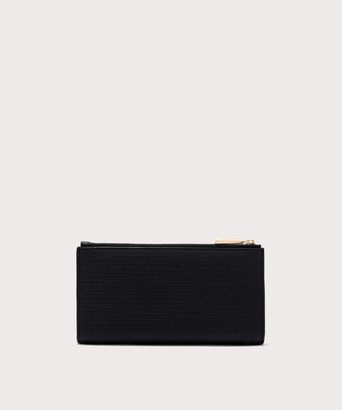 Dagne Dover Slim Wallet in black seen from the back.
