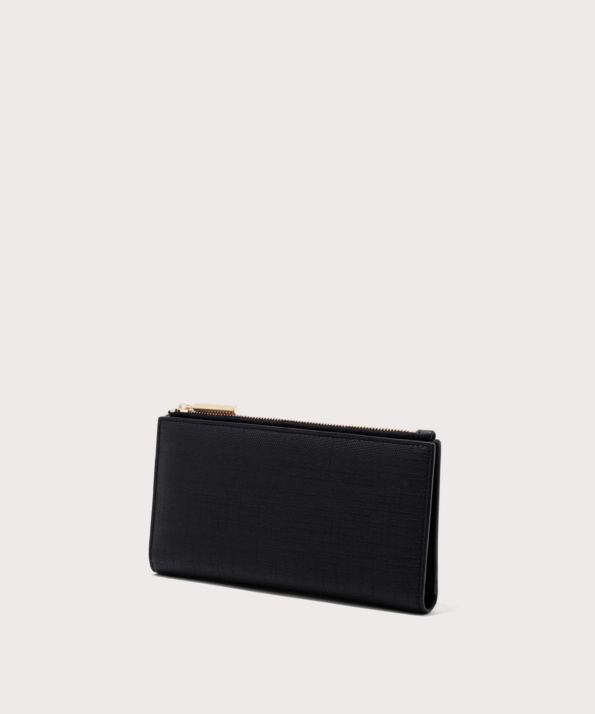 Dagne Dover Slim Wallet in black seen from an angle.
