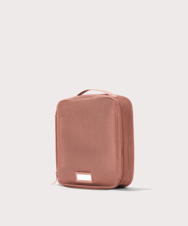 3/4 view of Large Roma packing cube in warm dust pink