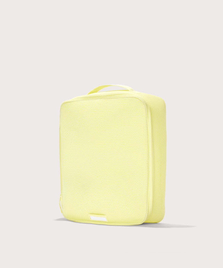 3/4 view of extra large Roma packing cube in citrine