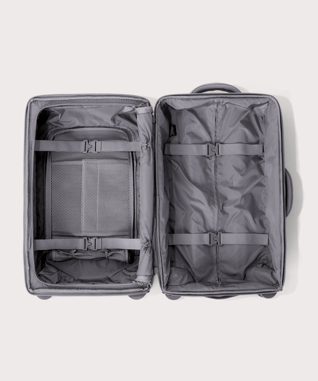 Top down of Seattle carry-on rolling luggage 23.5” in light grey 

