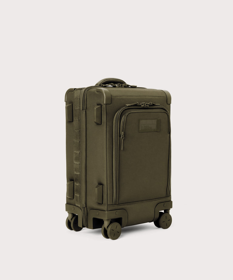 3/4 front view of Seattle carry-on rolling luggage 20.5” in dark green showing side luggage feet

