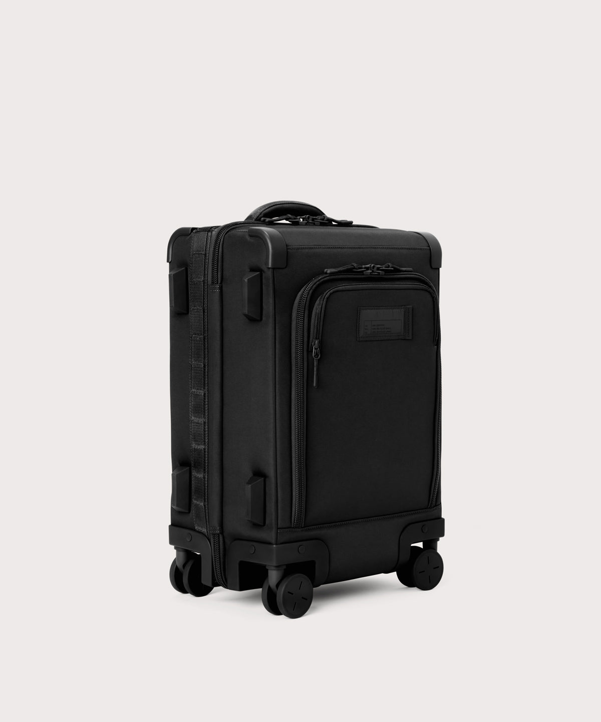 3/4 front view of Seattle carry-on rolling luggage 20.5” in onyx showing side luggage feet
