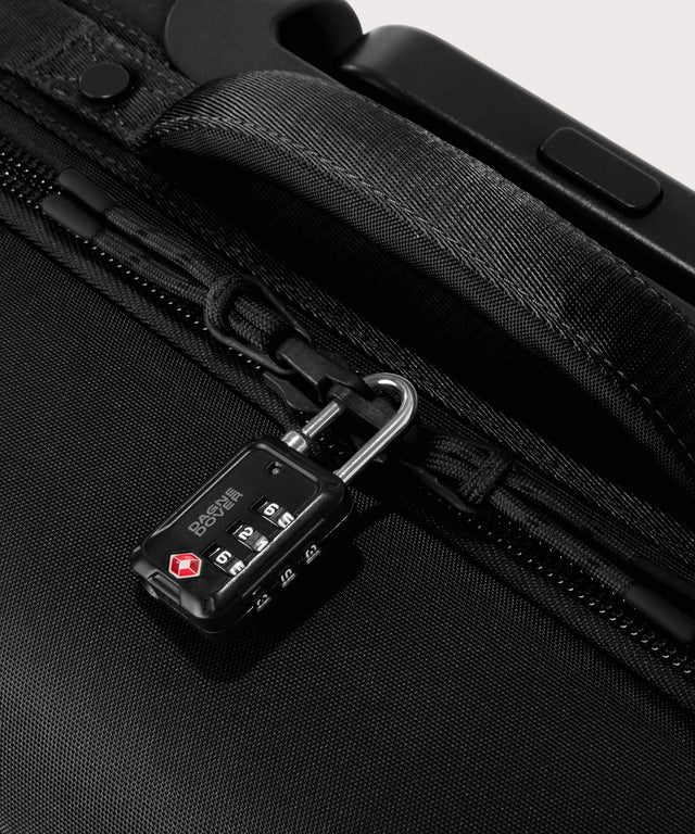 Detail shot of Sydney checked rolling luggage 25
