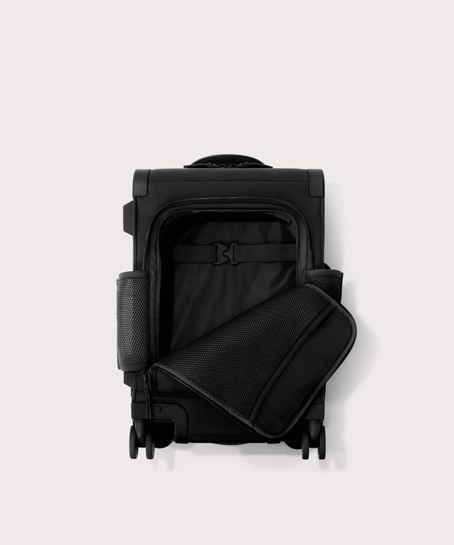 Top down of Seattle carry-on rolling luggage 20.5” in onyx with front flap opened. 
